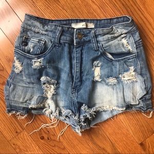 Super Distressed High Rise Jean shorts